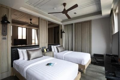 Two Bedroom Premier (1 King + 2 Single Beds)